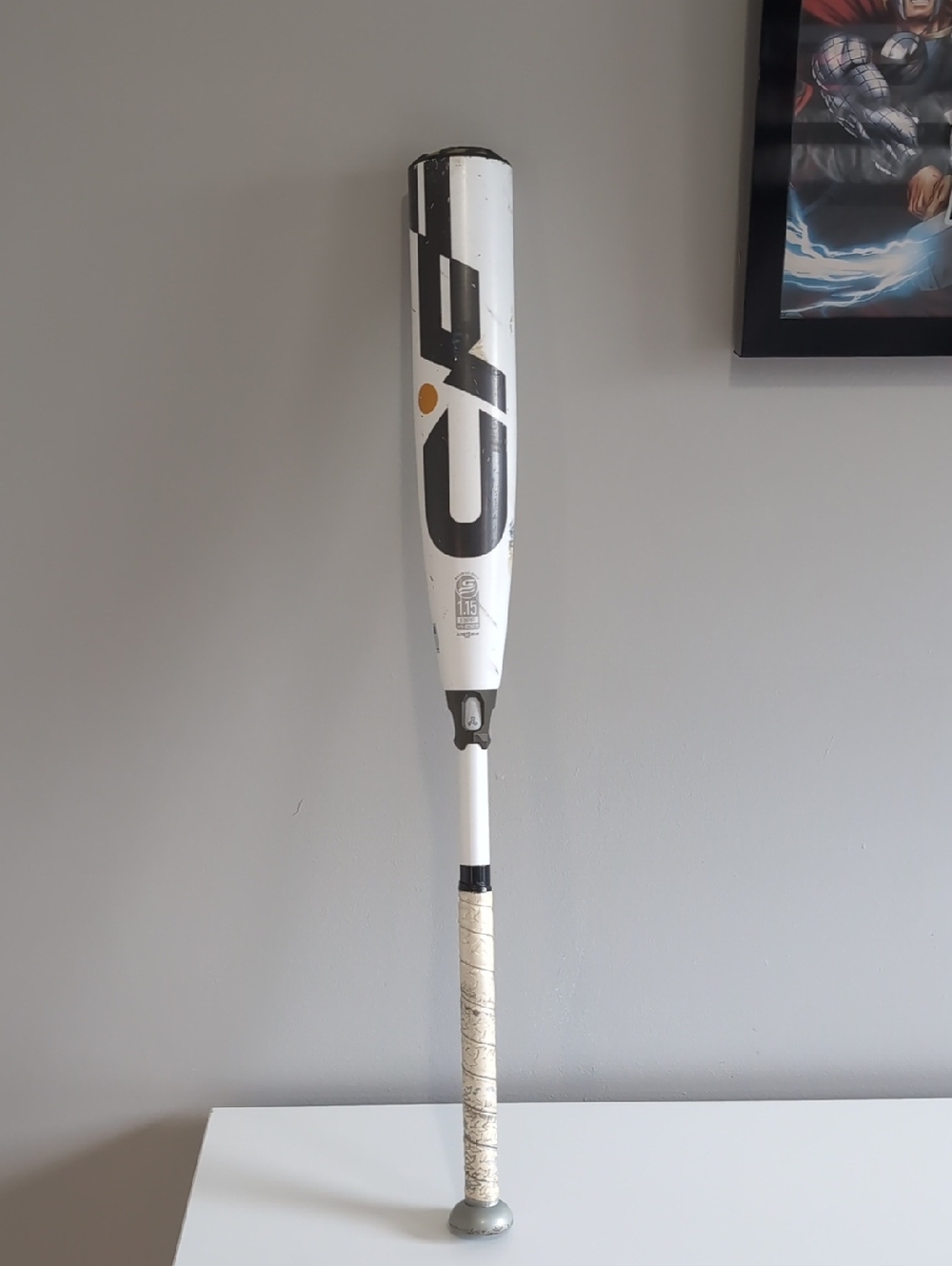 Easton Demarini 2025 - White and Black Youth Baseball Bat with Gold Dot